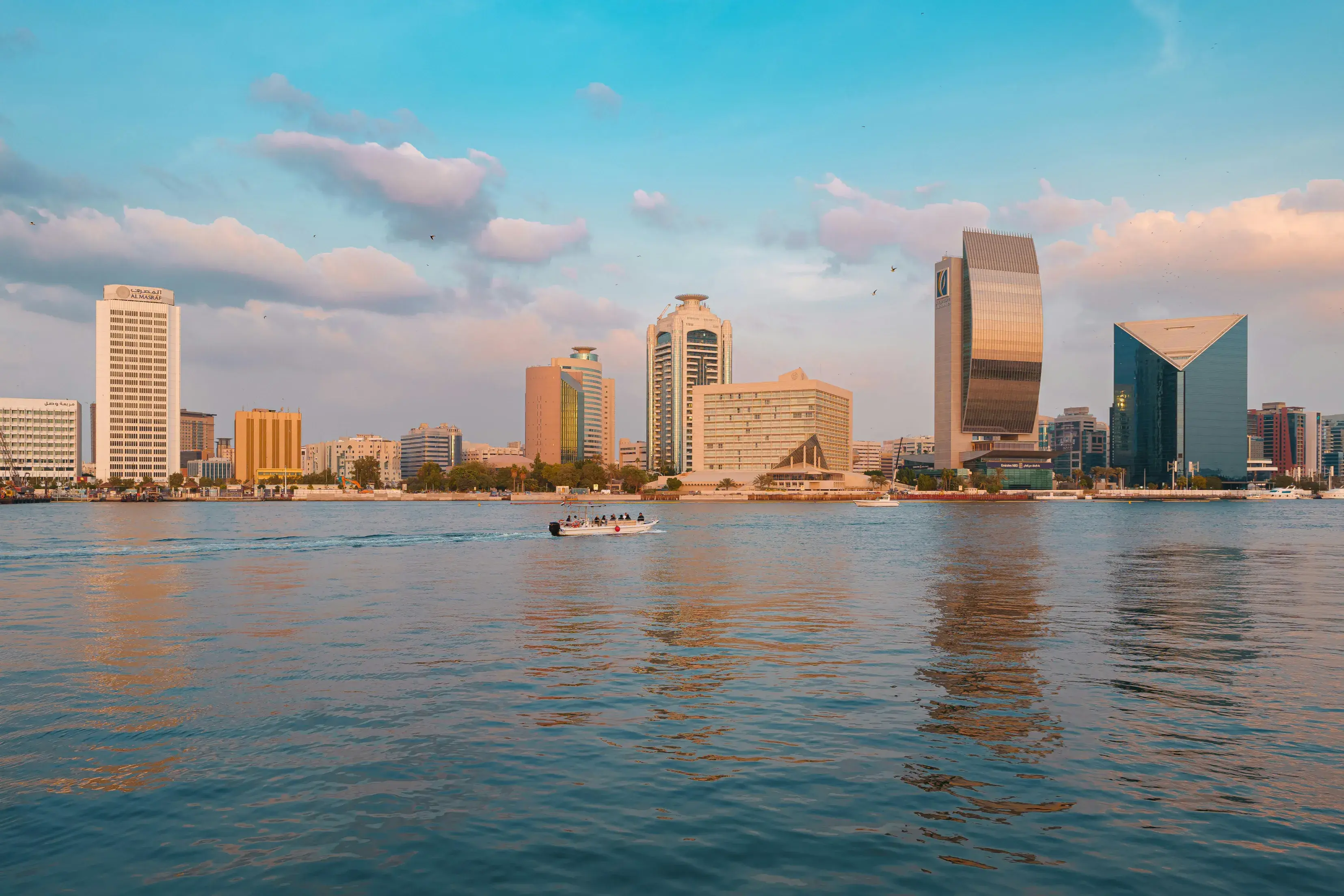 Dubai Skyline And Creek At Sunset